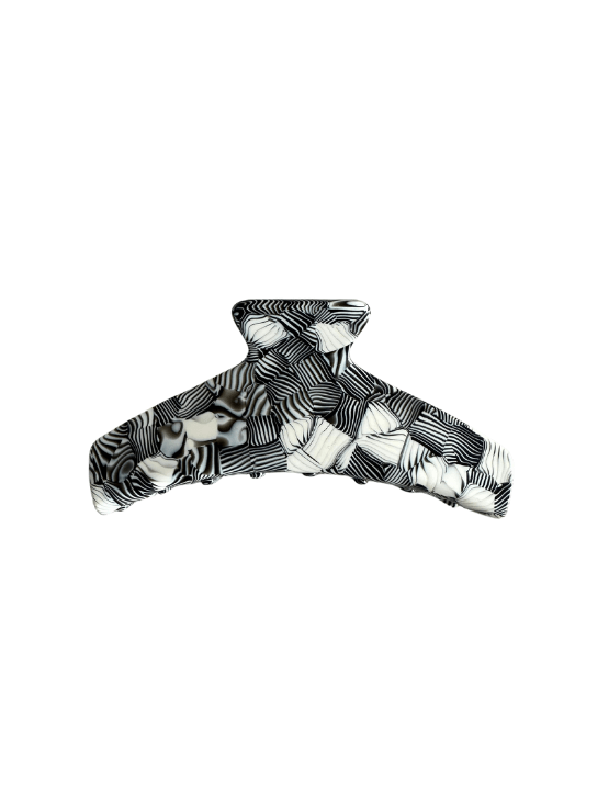 Hair Clip Rayas Negras un accesorio versátil que cuida tu cabello, evita enredos y sujeta con estilo sin maltratar la fibra capilar.