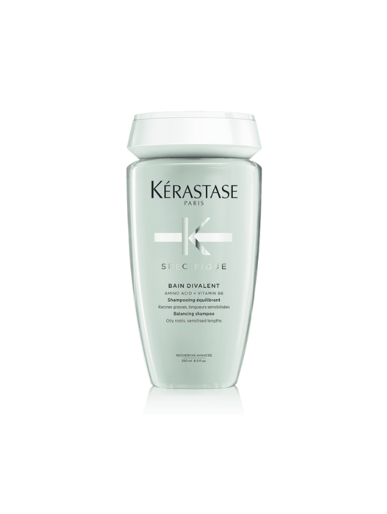 Kérastase Specifique Divalent Shampoo es un baño equilibrante que purifica las raíces grasas mientras hidrata y cuida los largos sensibilizados.